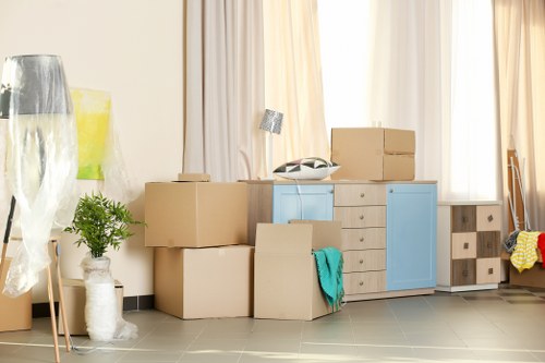 Movers handling boxes safely during a Greenwich removal