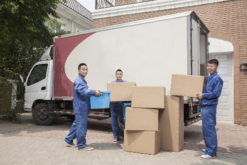 Residential moving support in Greenwich with boxes and furniture