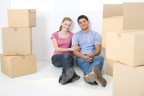 Packed office boxes and furniture ready for transport in Greenwich