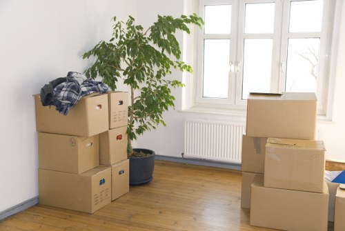Moving team maintaining safety standards while loading a van