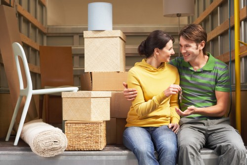 Packing and loading household items for Greenwich relocation